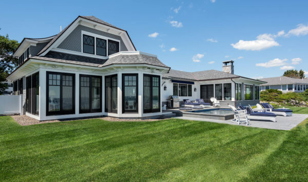 A small pool, deck and patio designed to enjoy the view and the lawn are centrally located between the sunroom, kitchen and living room with ease of access to all spaces from the interior to the exterior. the ocean. Photographs by Rob Karosis.